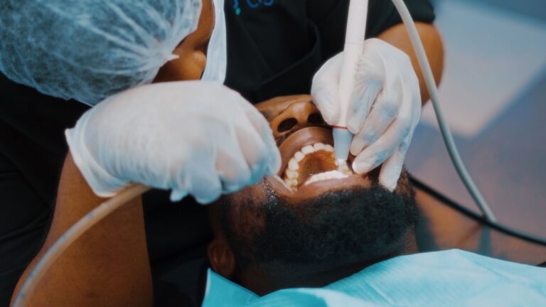 Close-up of a dentist performing a dental procedure on a patient in Lagos clinic.