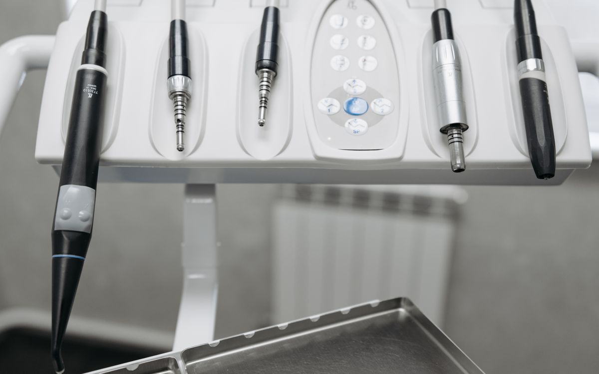Detailed shot of modern dental tools in a dentist's office, emphasizing precision and hygiene.
