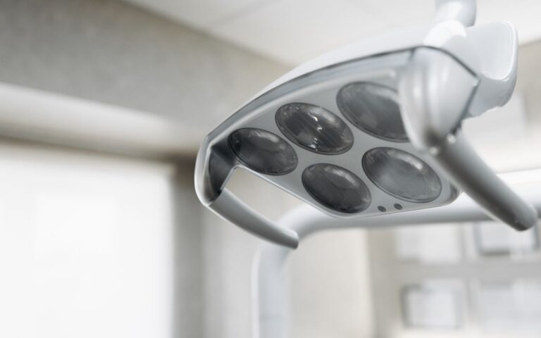 Close-up view of a modern dental operatory light inside a clinic.